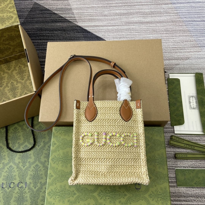 G*u*i top handle bags